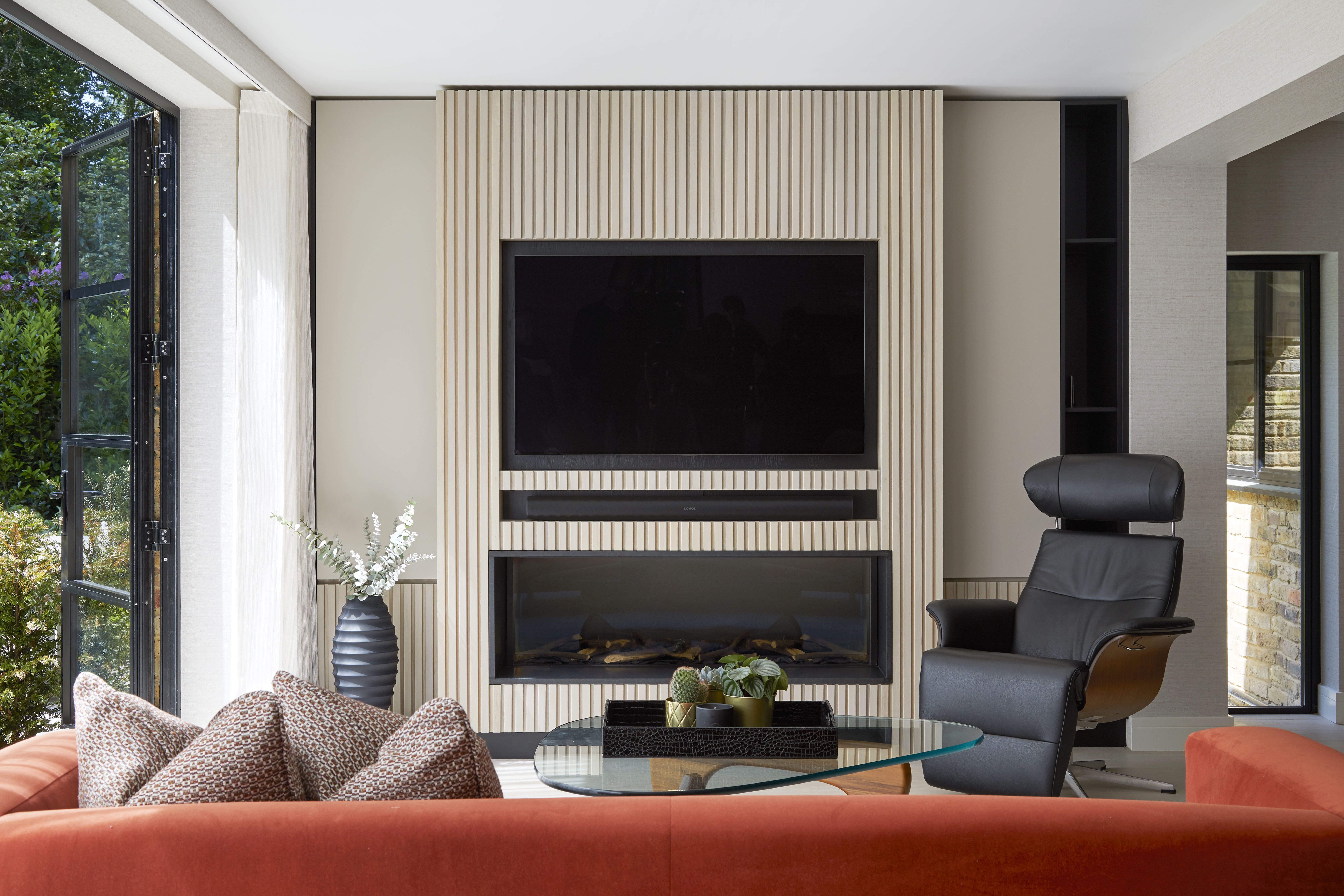 Contemporary renovation, Sunningdale, bespoke TV and fireplace