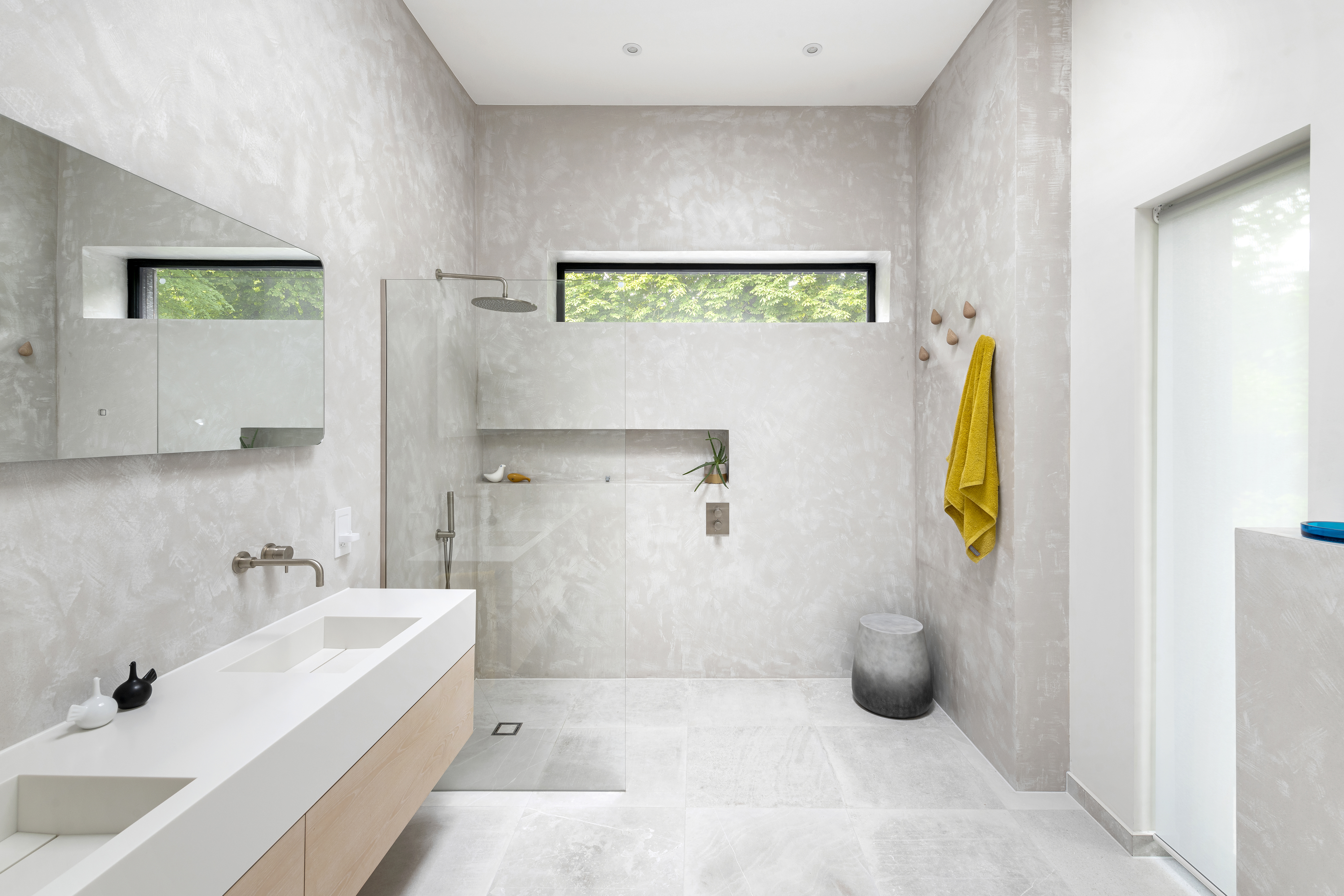 Microcement bathroom walls, Corian bespoke vanity