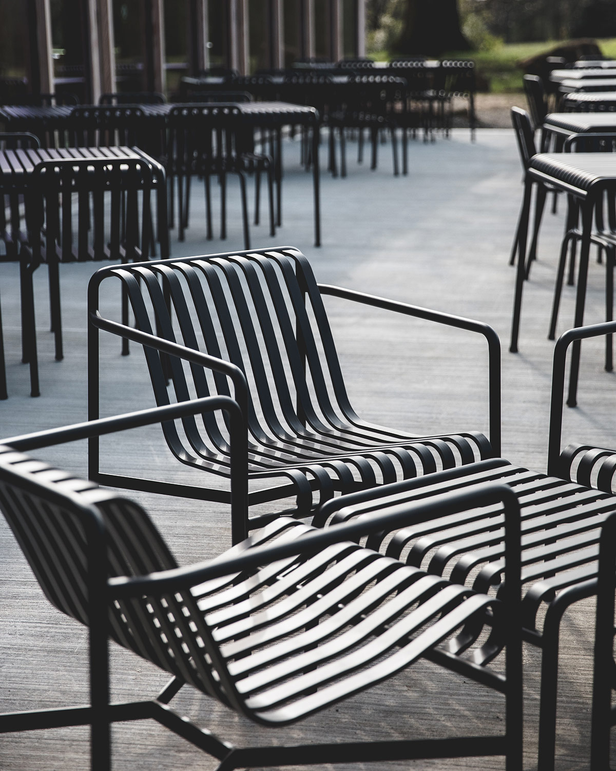 Outside the Weston featuring HAY Palisade armchairs and tables