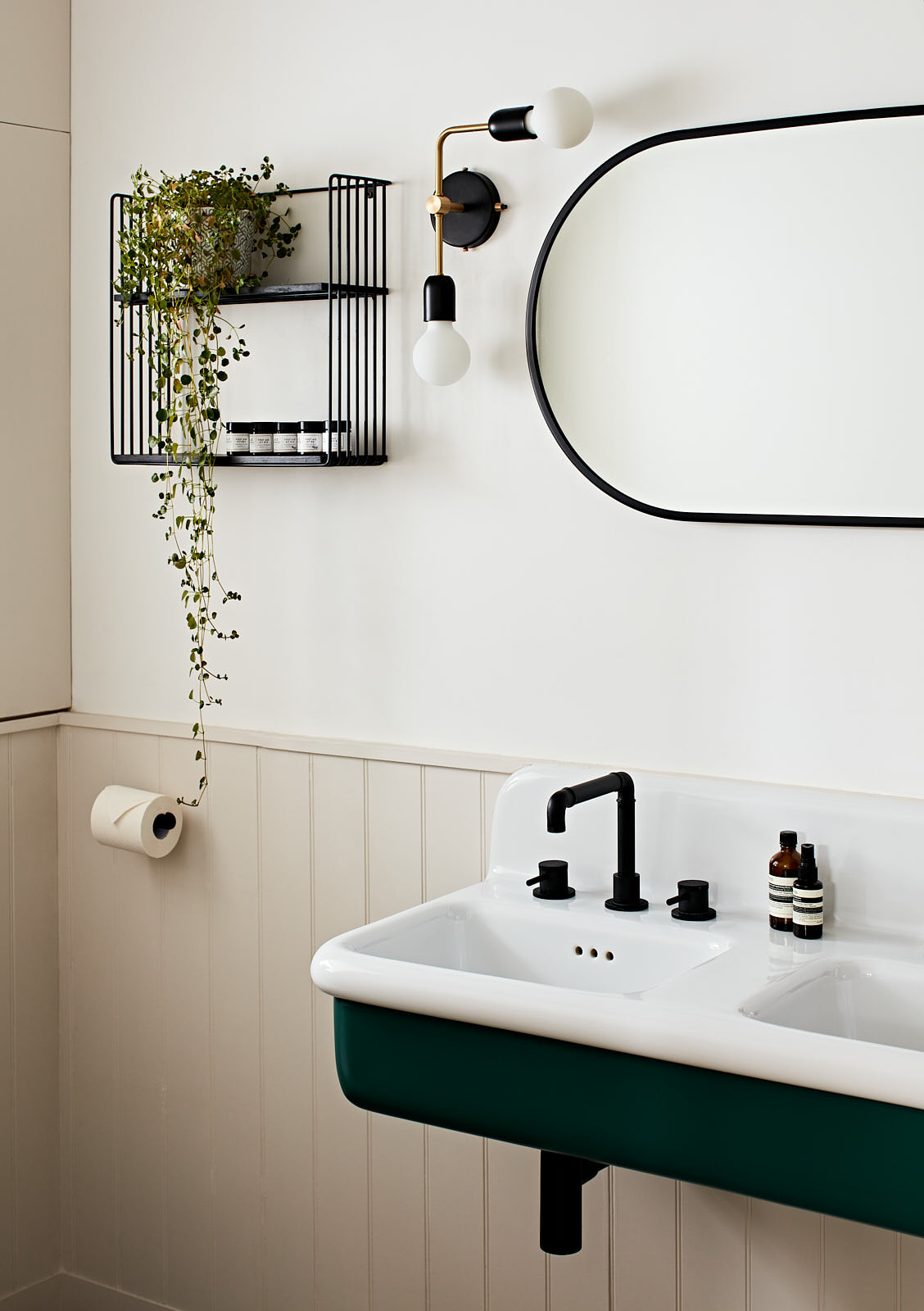 This industrial style, enamelled double vanity unit was the perfect fit to make an impact in this compact ensuite.