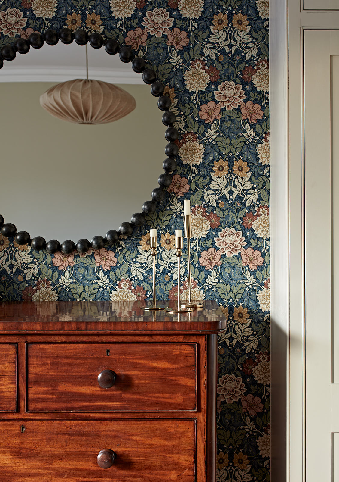 Using a Scandinavian floral wallpaper together with the clients antique furniture pieces, as well as textural accents created a contemporary feel in the master bedroom.