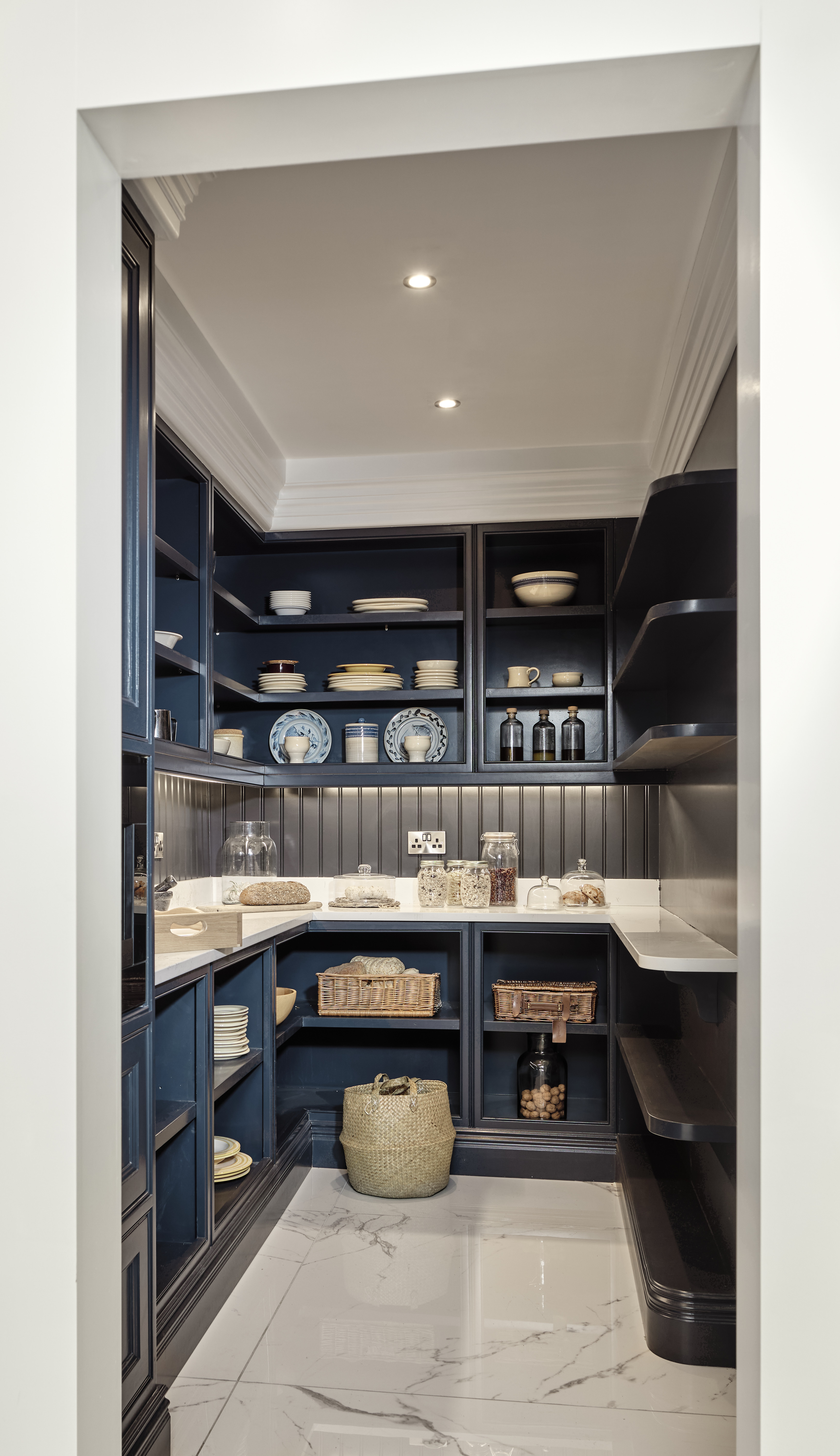 Walk in Pantry off the kitchen, painted in Christoff Thistle with italian porcelain tiles continuing on from the kitchen.