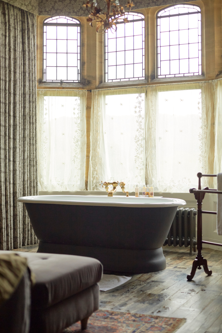 Rimini cast iron bath in the window at The Pig