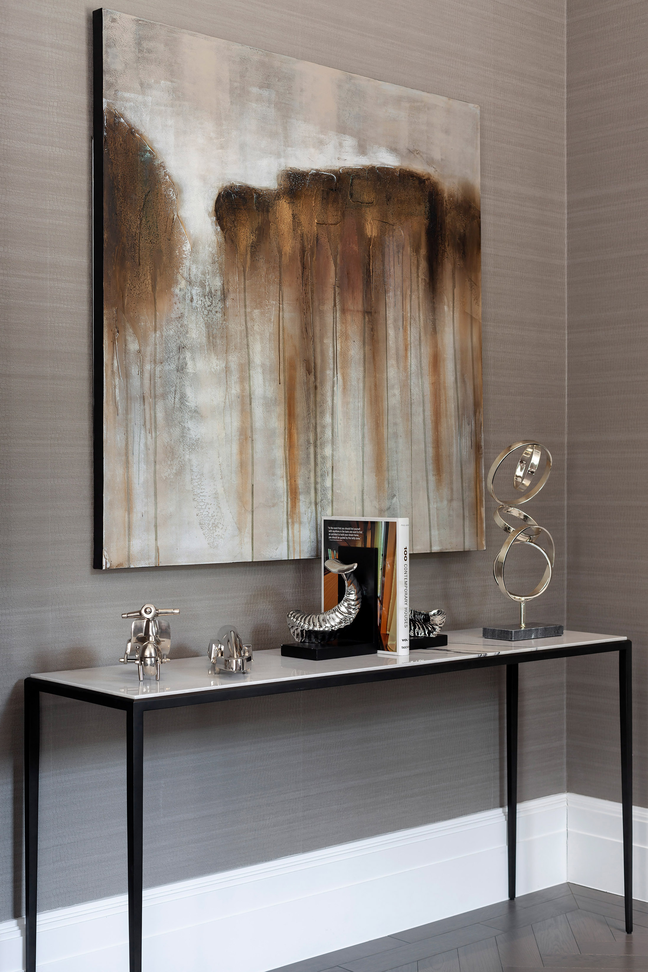 Bespoke artwork above the console table in His study 