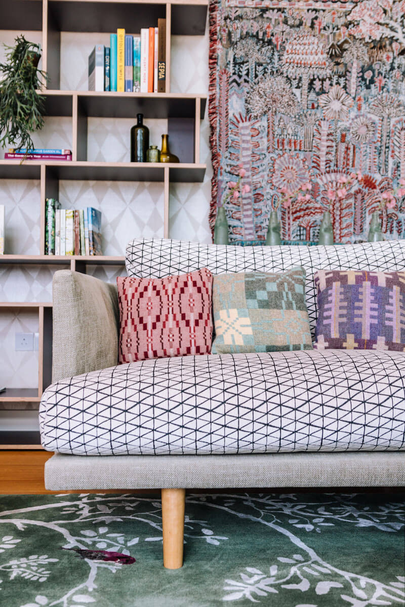 Living Room with bespoke sif and shelving unit & wall hanging