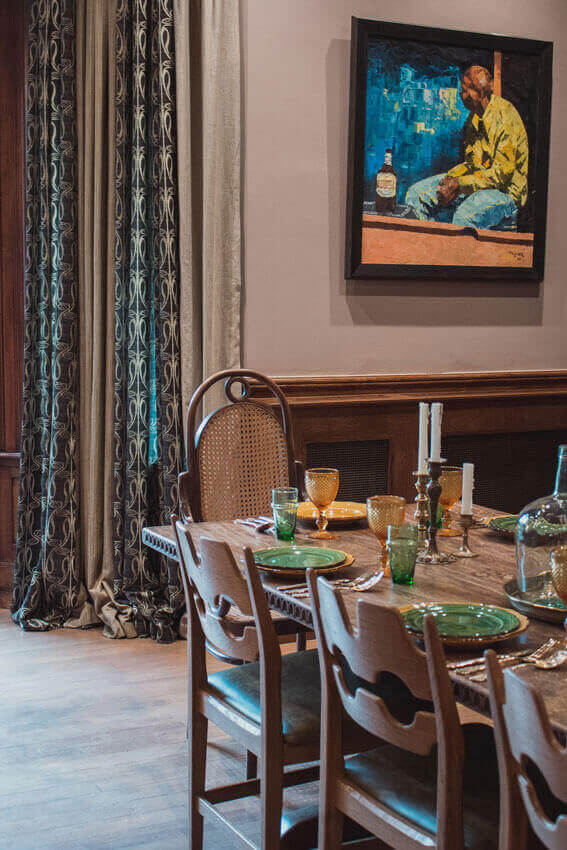 Dining Room with vintage chair and table and artwork