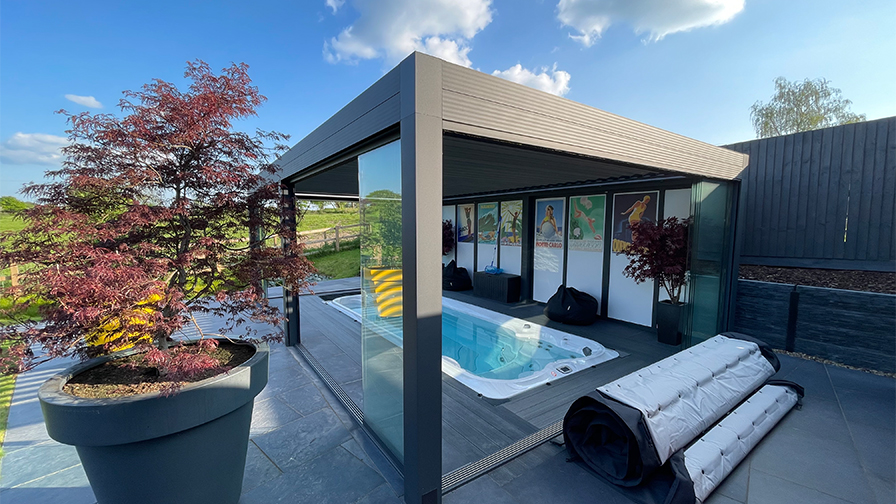 Louvred Roof pergola with glass sliding doors over a swim spa