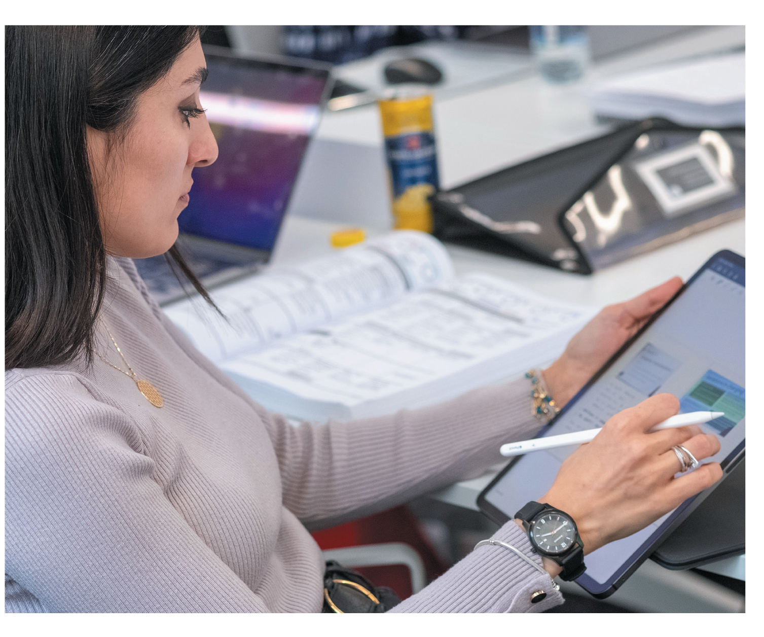 woman looking at a tablet