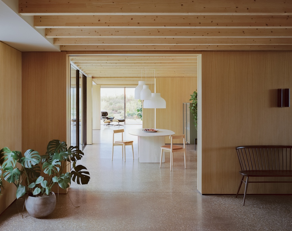 A contemporary dining clad in wood
