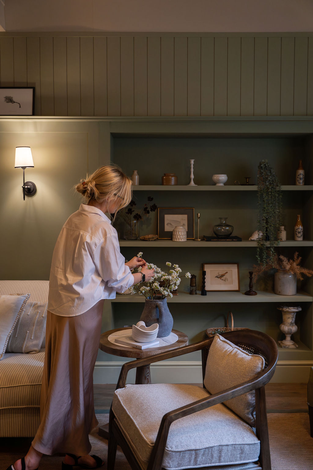 Sophie Chapman of Studio Gorse, arranging to foliage at the prestigious Coinage House project in Truro, Cornwall