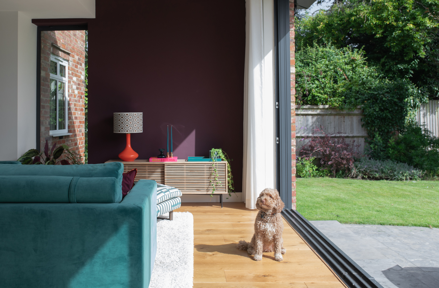 The open plan living space is perfect for placing bold, striking colours and prints