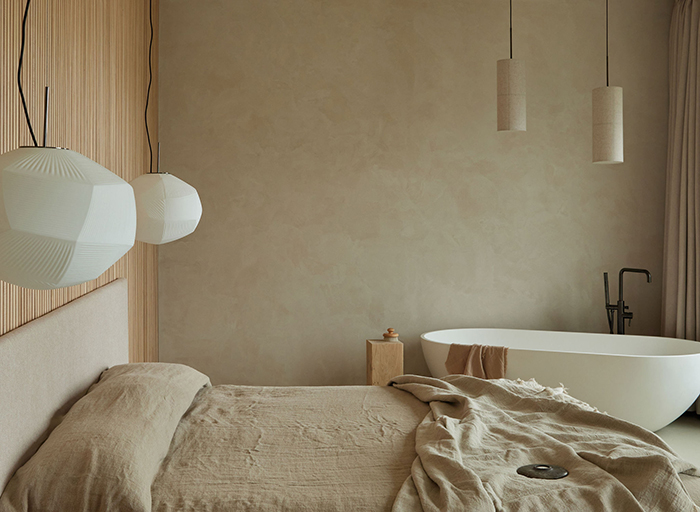 Master bedroom with freestanding bath.