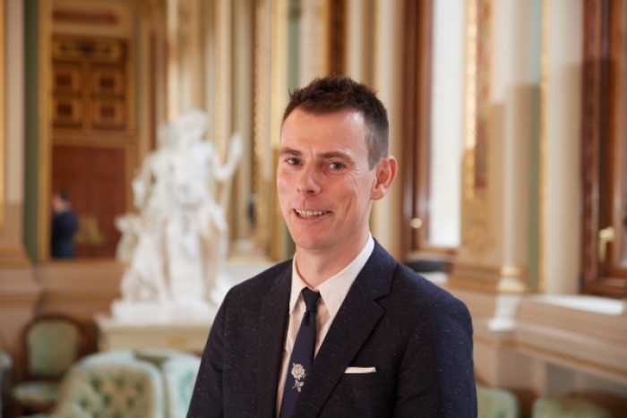 smiling man in a suit