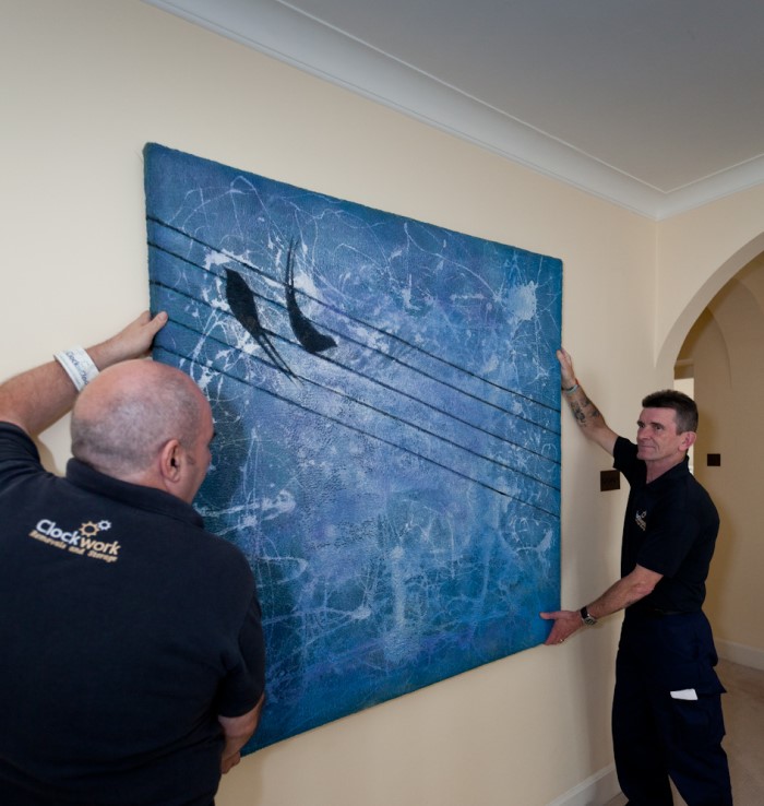 Art Being Hung