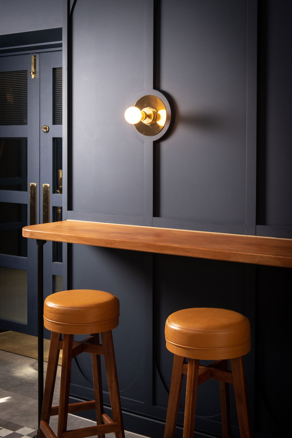 Stools and wall ledge table