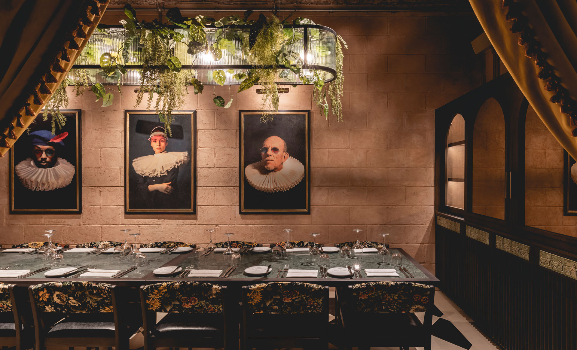 Dining table with artwork on walls