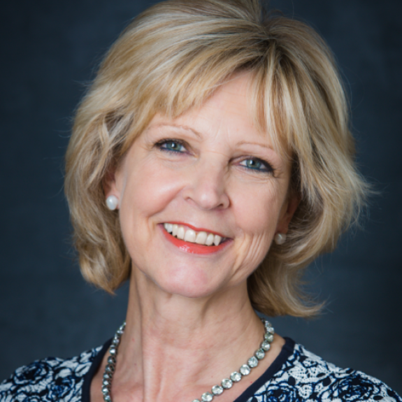 Headshot of Claire Tull smiling into camera