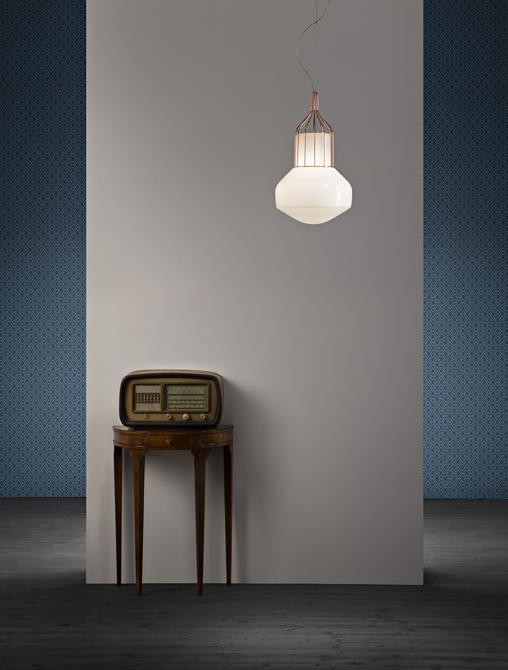 AEAROSTAT Hand blown glass inside a metal cage