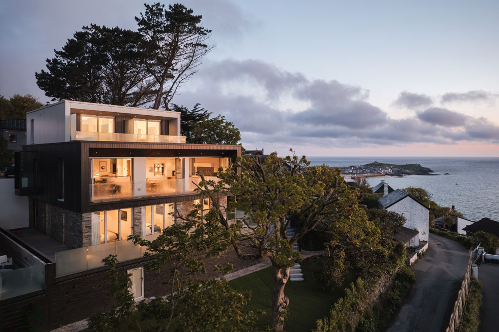 House windows reflecting the sunset