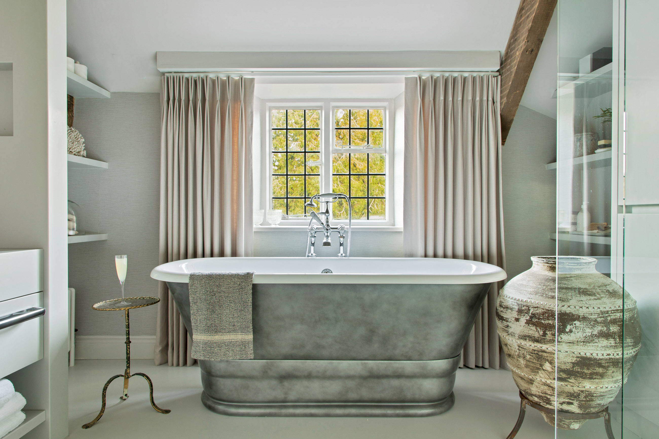 Bathroom with silver bath