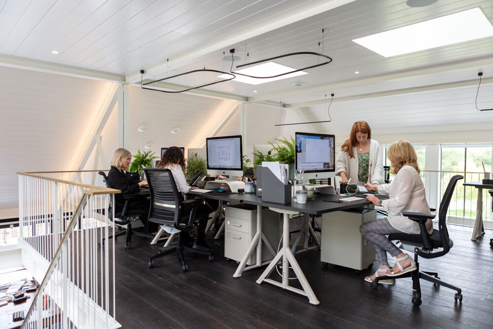 Office space with people working at desks