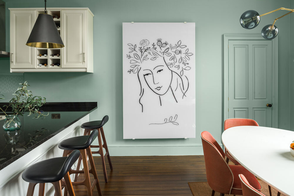 Kitchen with large artwork