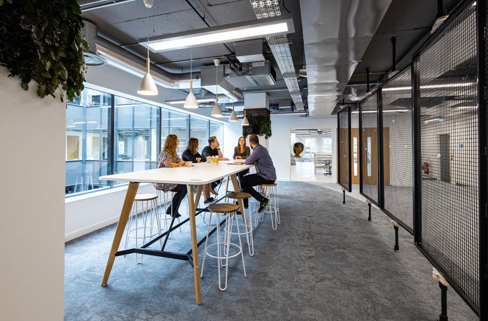 Meeting tables with people talking