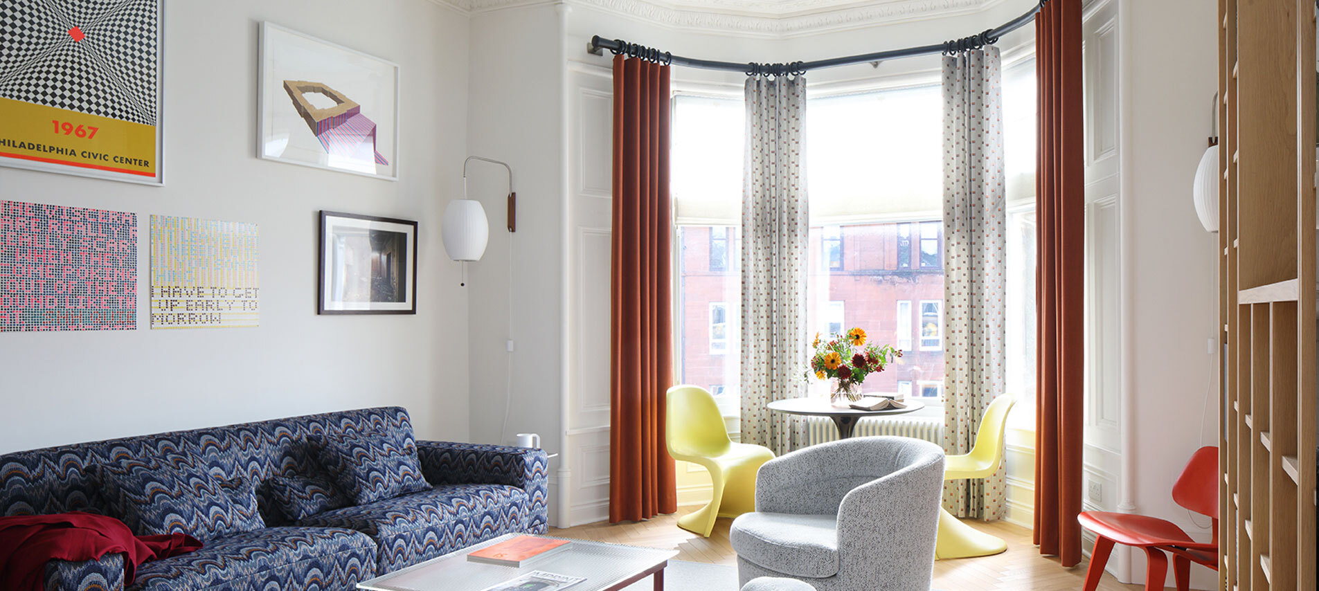 Living room with sofa and large bay window