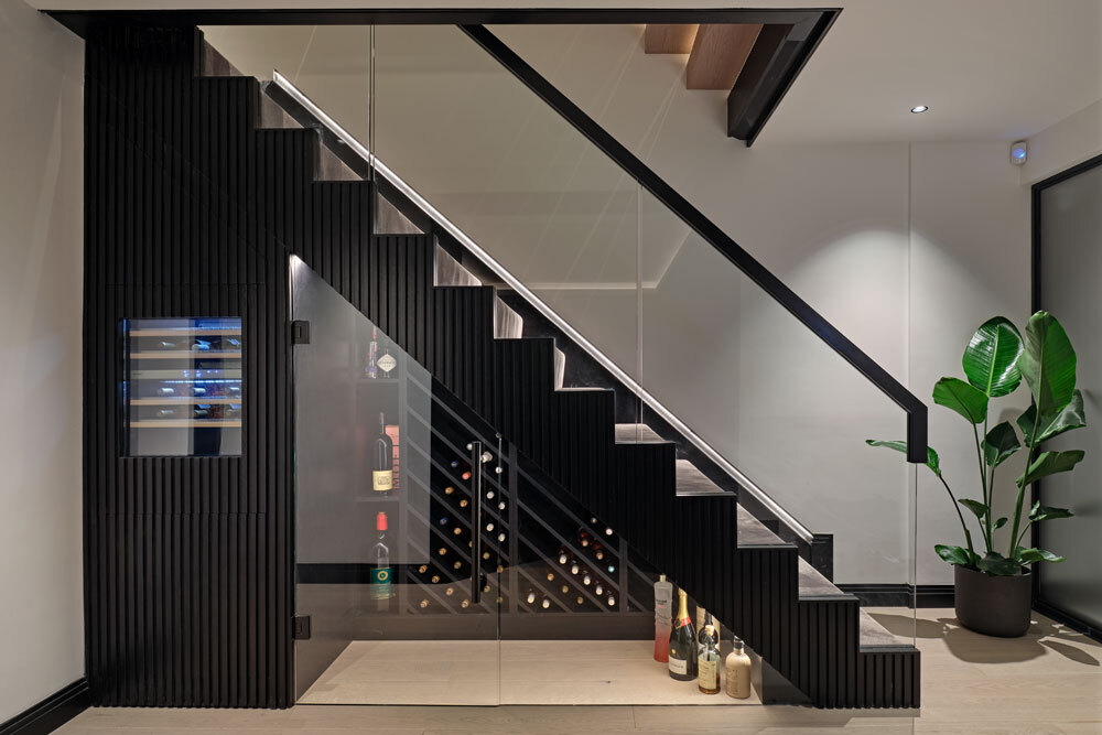 Modern staircase with glass storage 