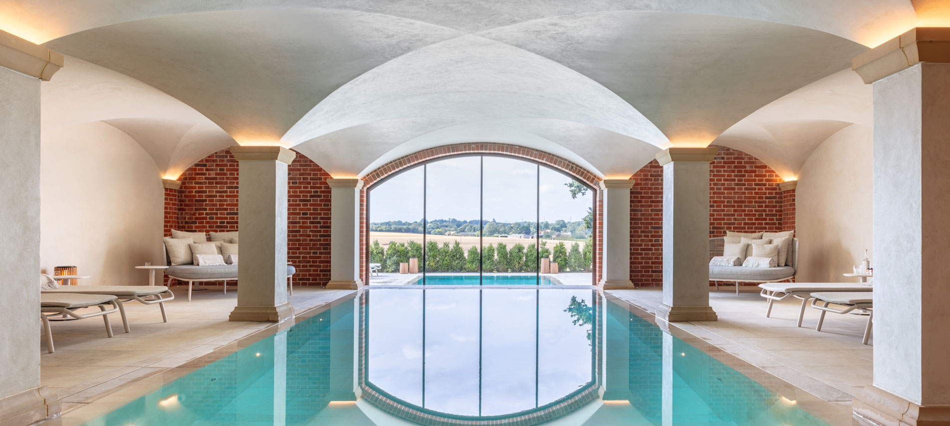 Swimming pool with large full height window.