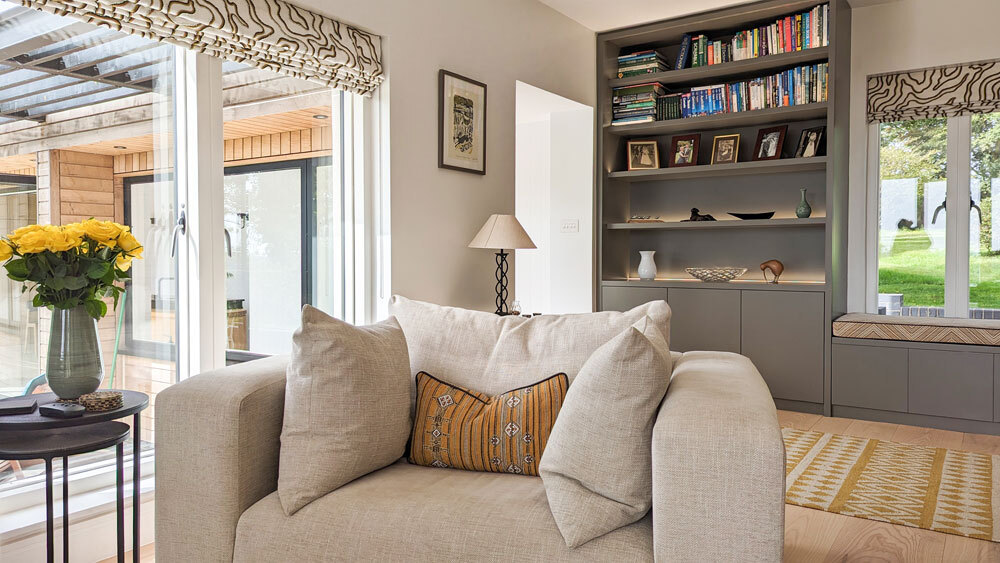 Living room with shelfs and chair