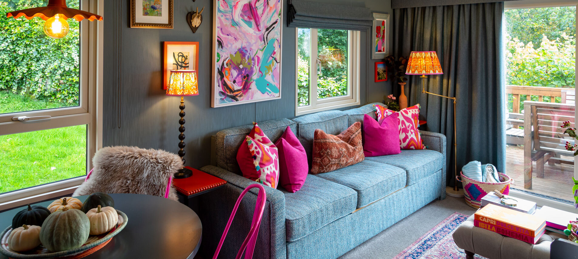 Living area with sofas and lamps