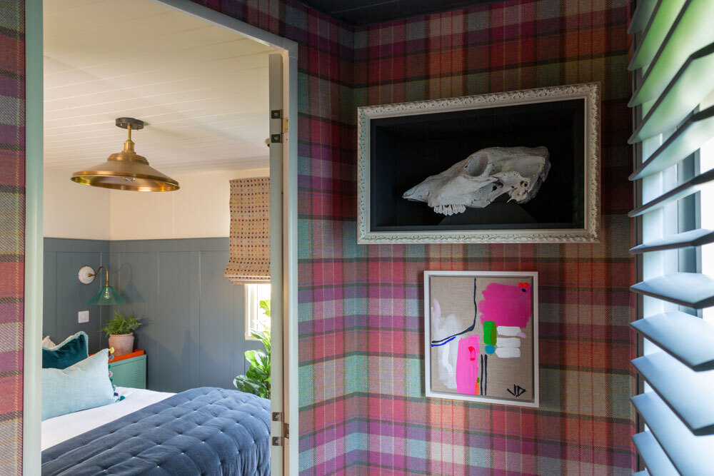 Wallpaper hallway leading to bedroom