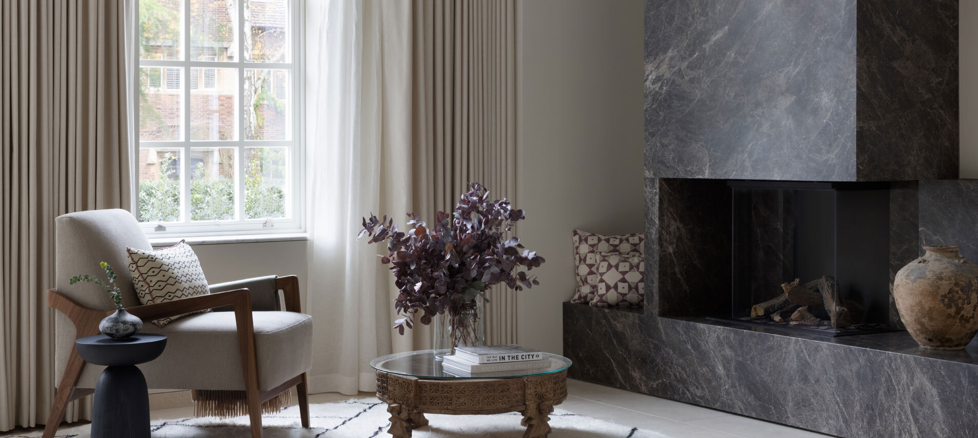 Room with fireplace and chair