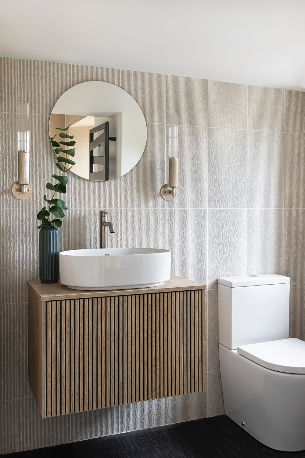 Sink and toilet in bathroom