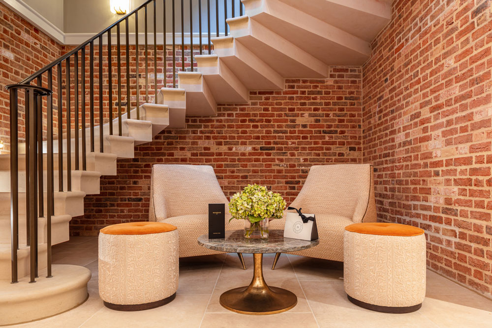 Reception area with seating under the staircase