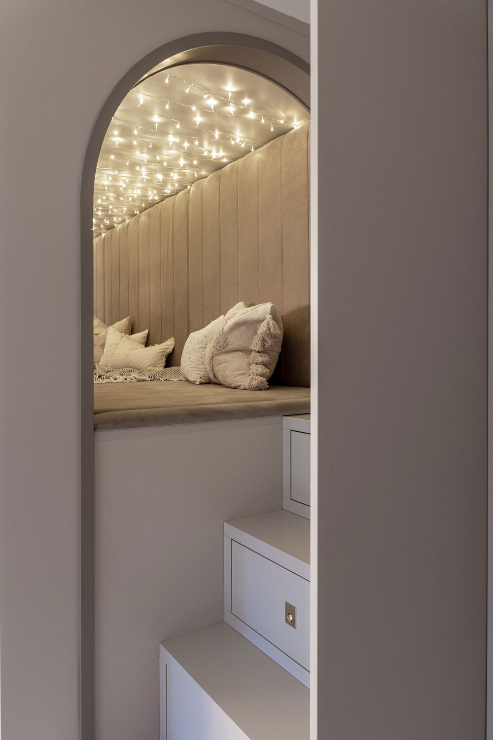 Archway revealing hide out using fairy lights 