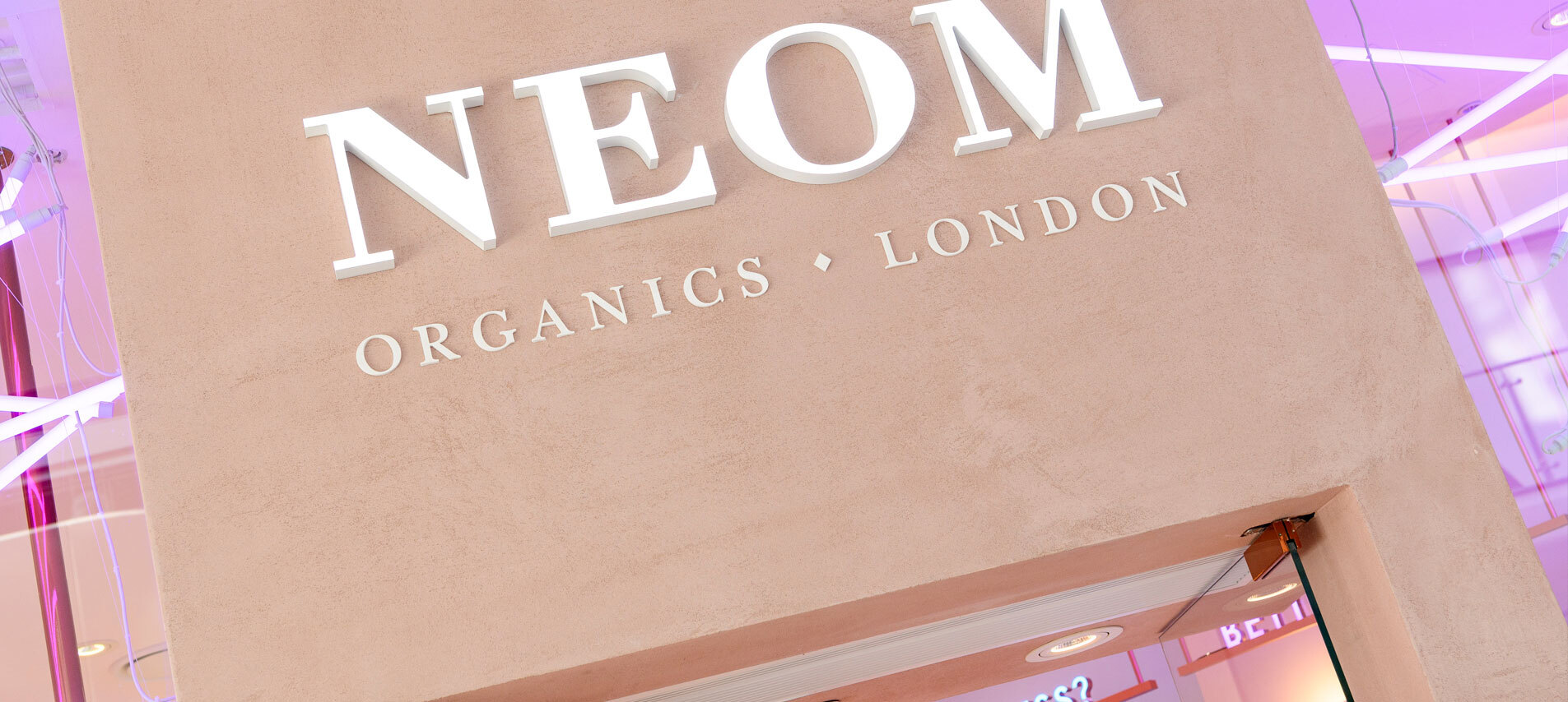 NEOM Organics shop sign 