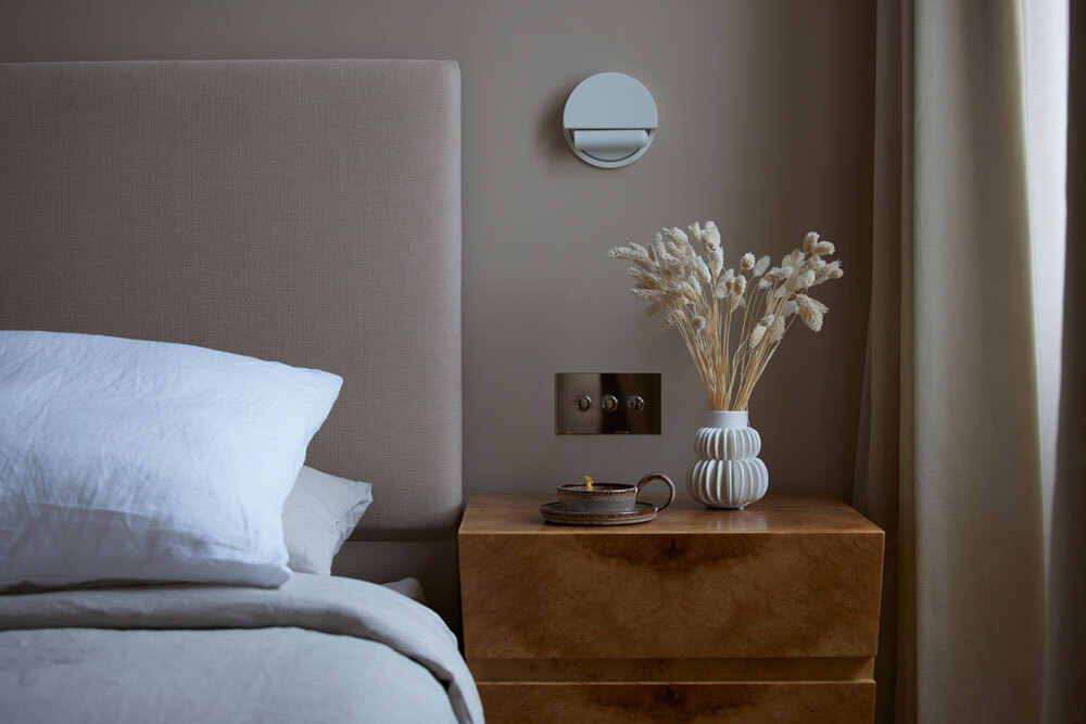 Bed with bedside table