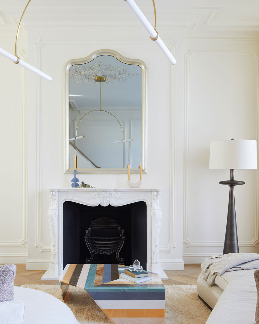 Living room with fireplace and lamp