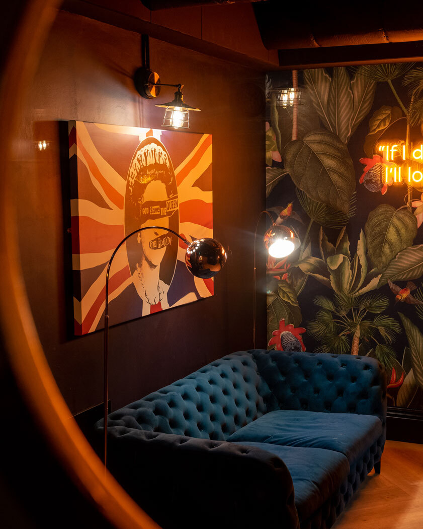 Seating with artwork on wall