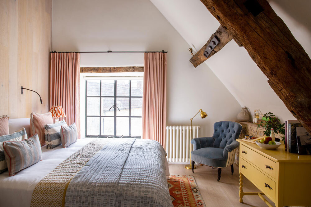 Bedroom with bed and drawers