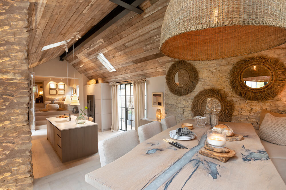 Dining area with pale chairs