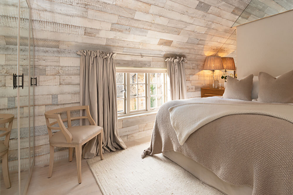 Bedroom with bed and chair