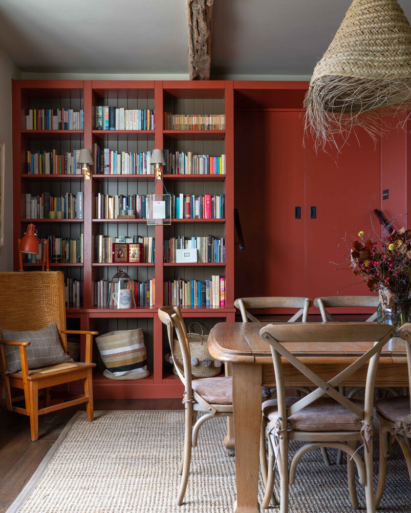 Room with dining table and bookshelf 