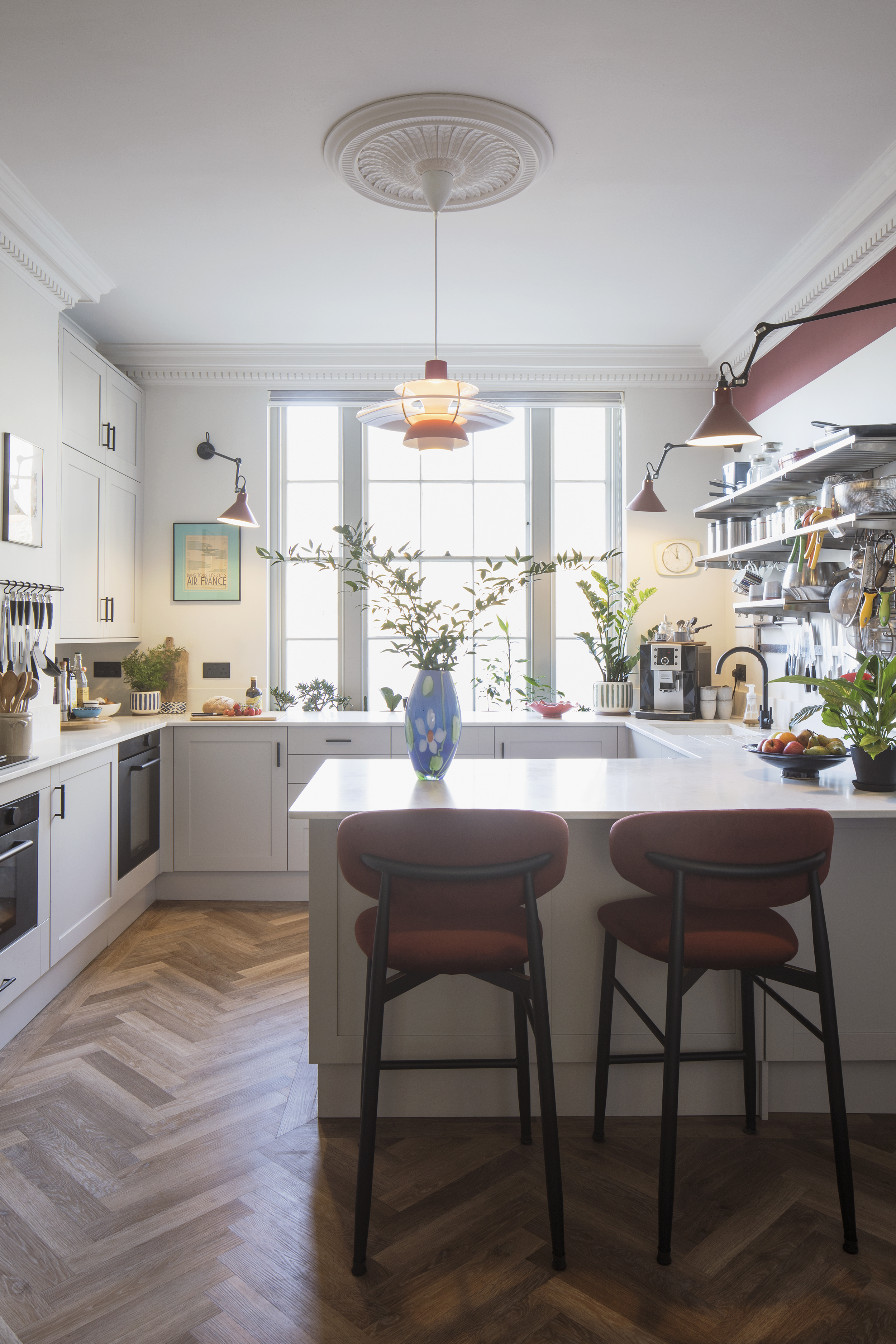 Neutral toned shaker kitchen with peninsula island.  