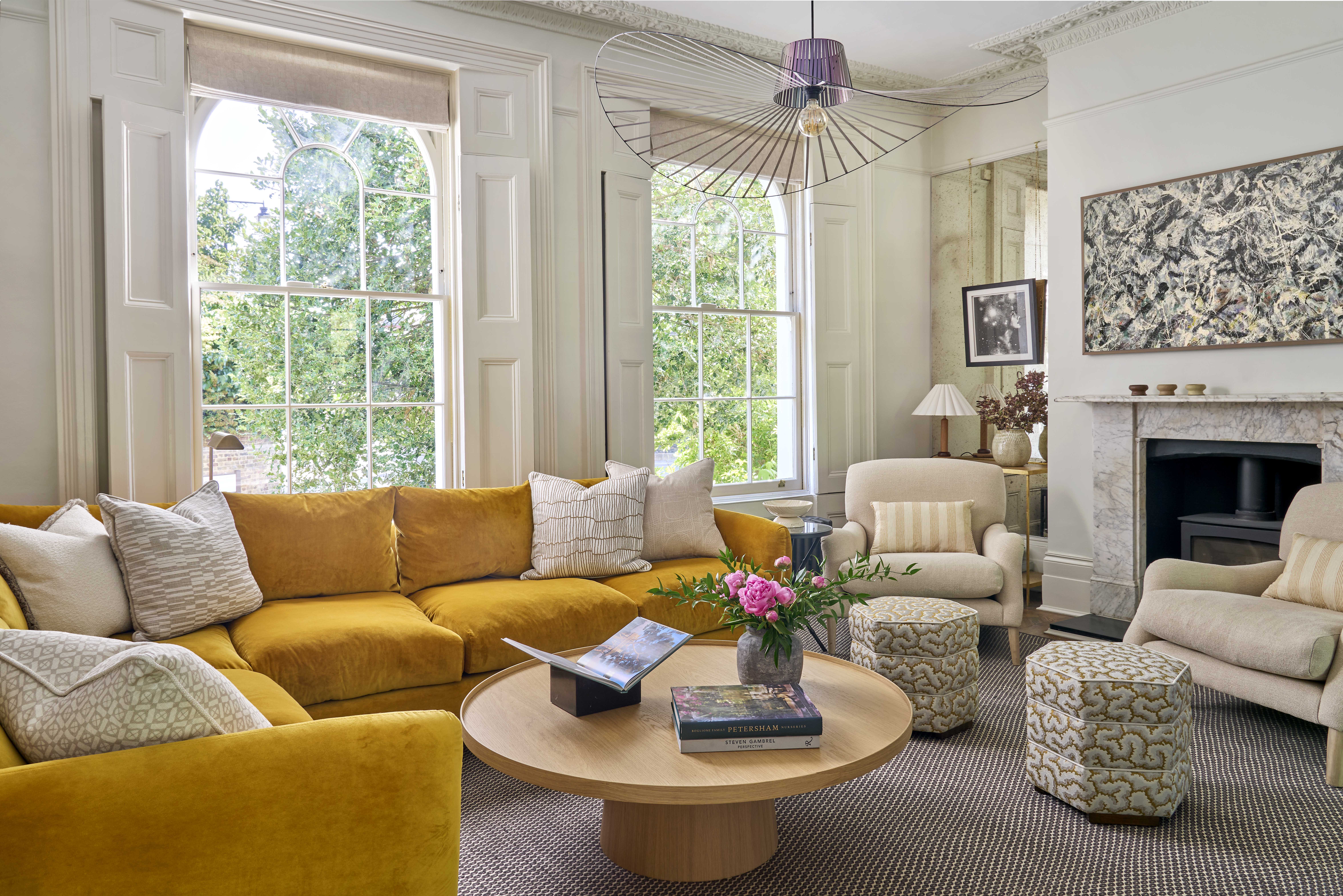 The sitting room is layered with comfortable and refined pieces
