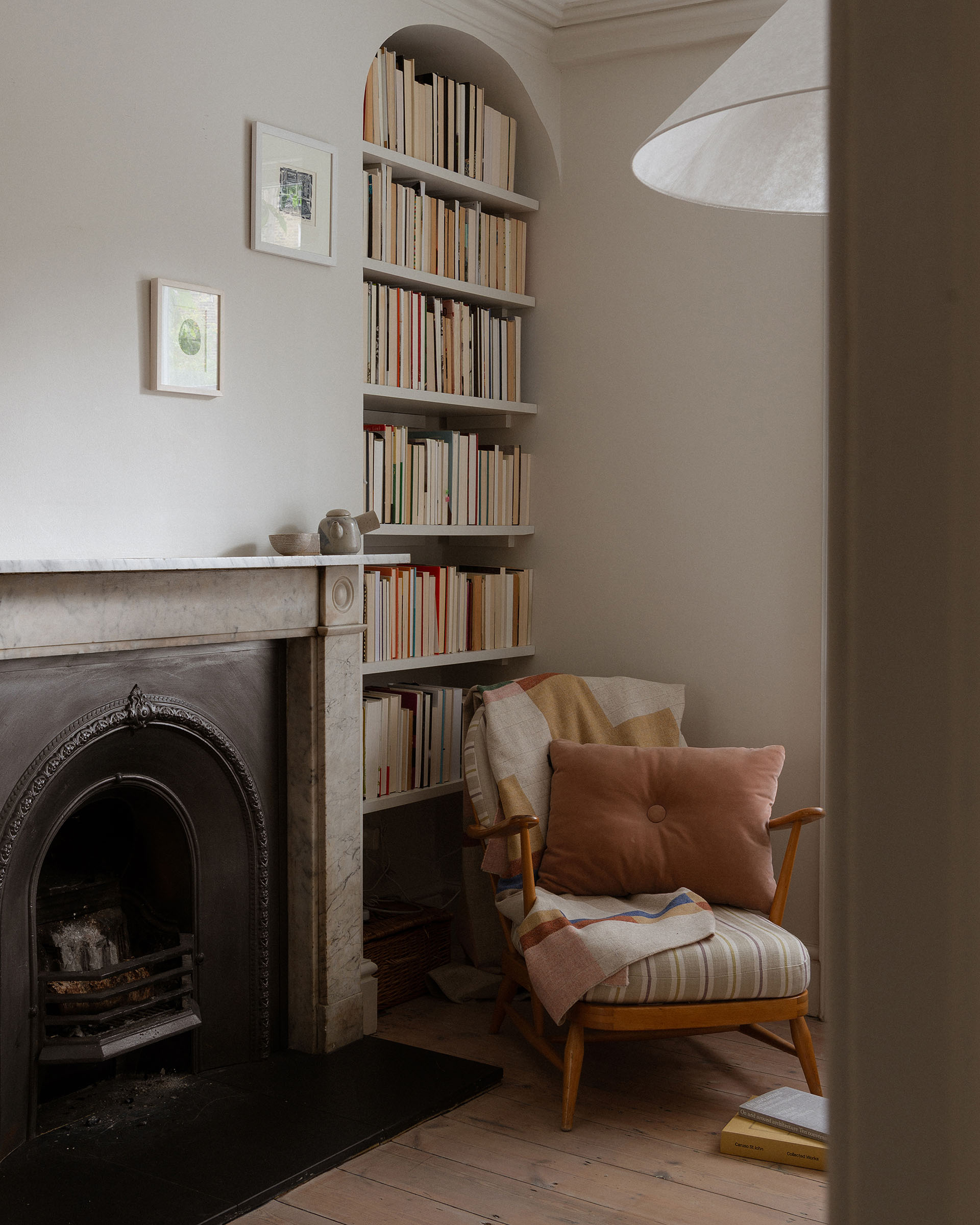 Georgian house interior design: living room with fireplace and ercol chair