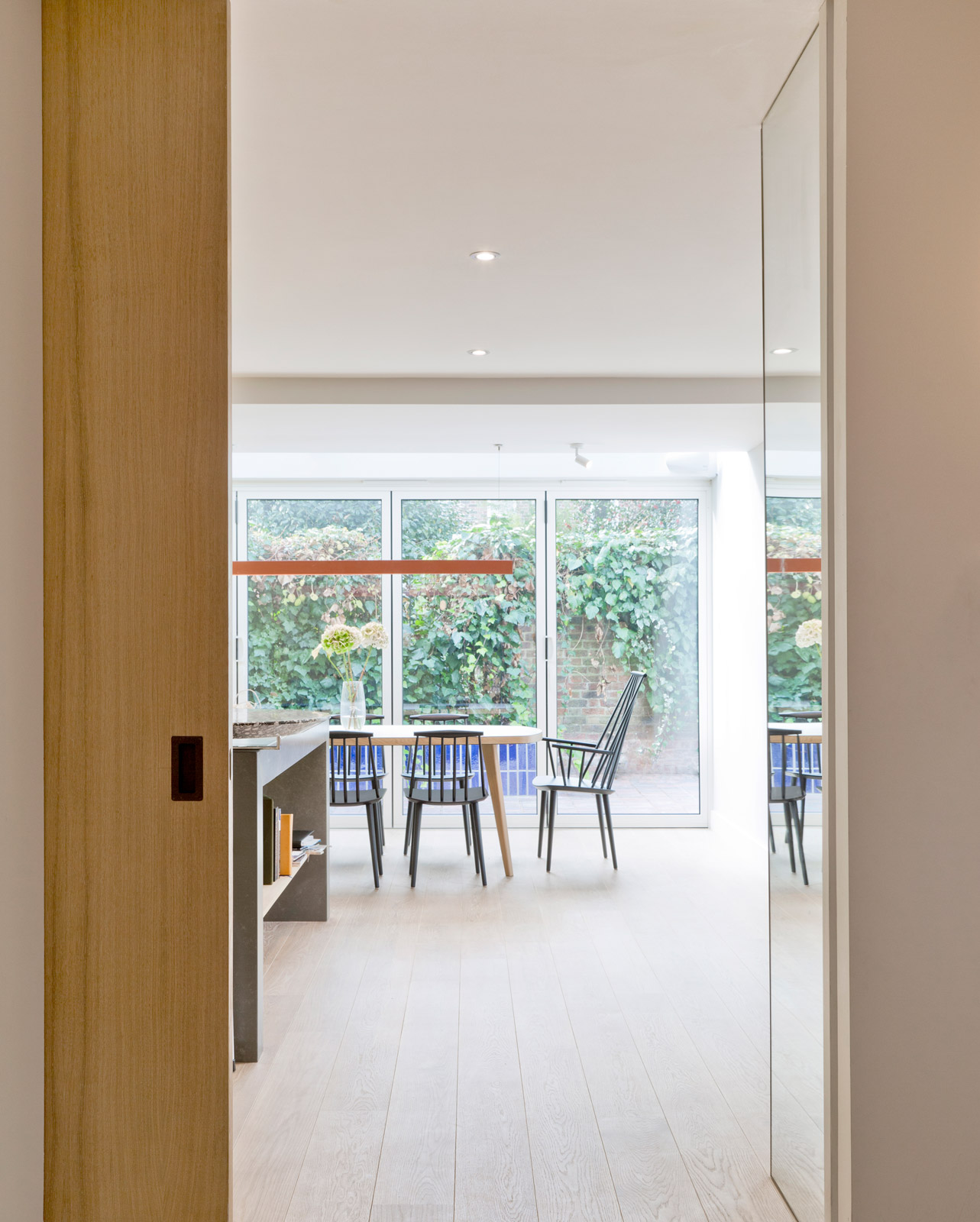 Modern rear extension and kitchen in a house in Holland park