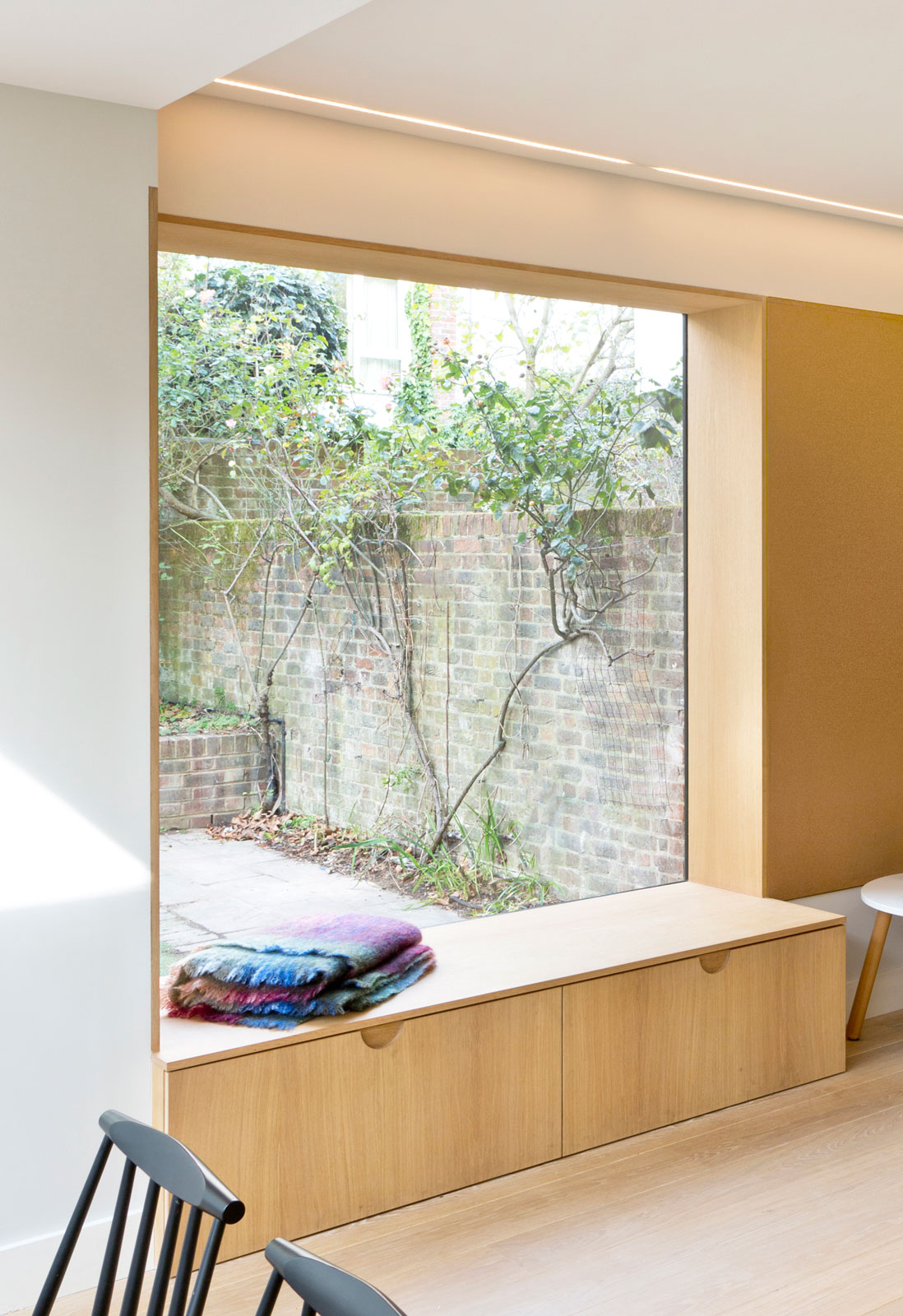 Glass rear extension and side window in a house in Holland Park, RBKC